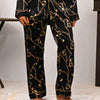 Abstract Black And Golden Silk Night Suit for Women | Notch Collar, Loose Fit Shirt, Trouser & Eye Cover Set